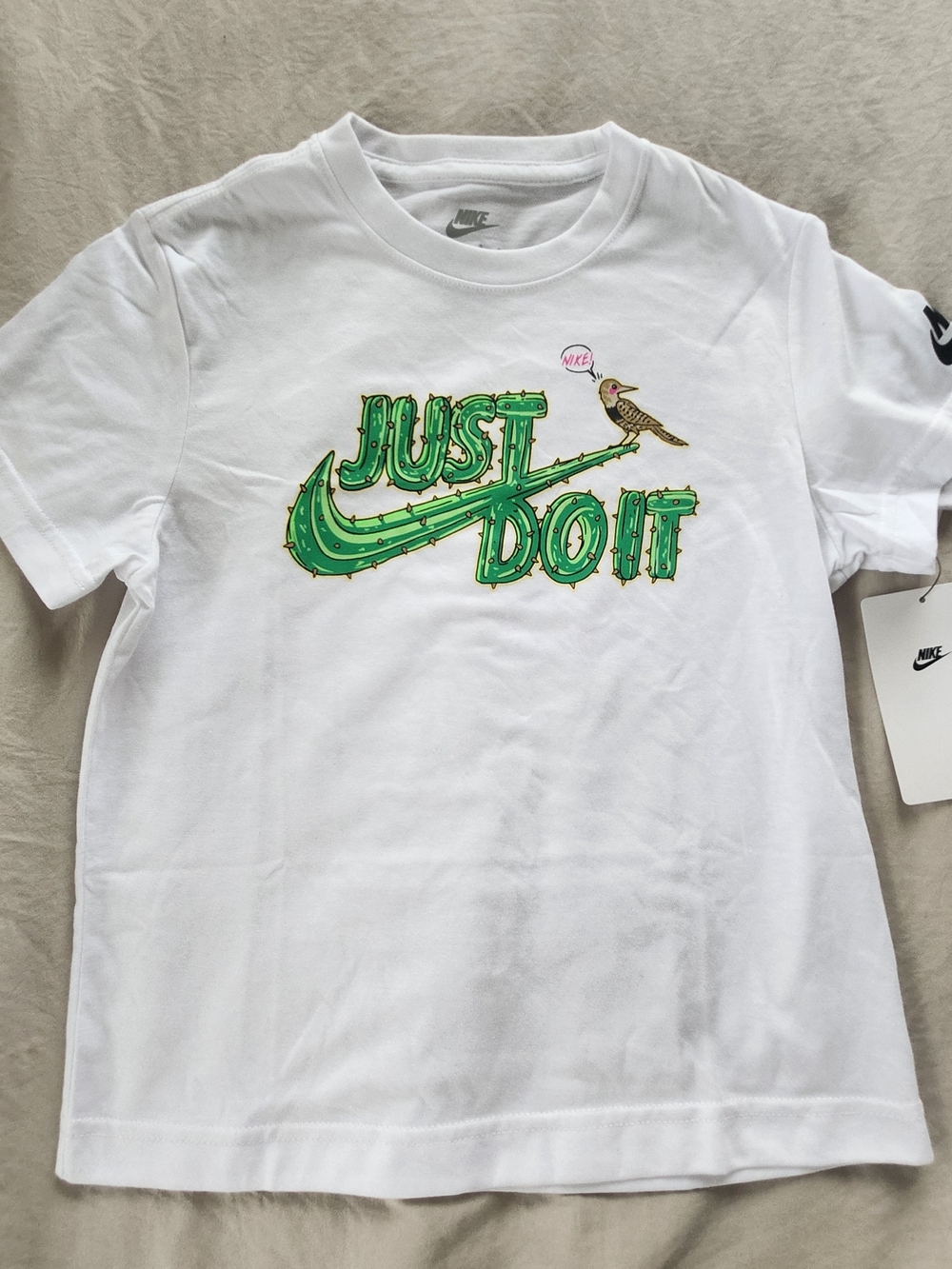 Nike White Kids Short Sleeve Tee with Green Cactus 'Just Do It' Graphic Size 7